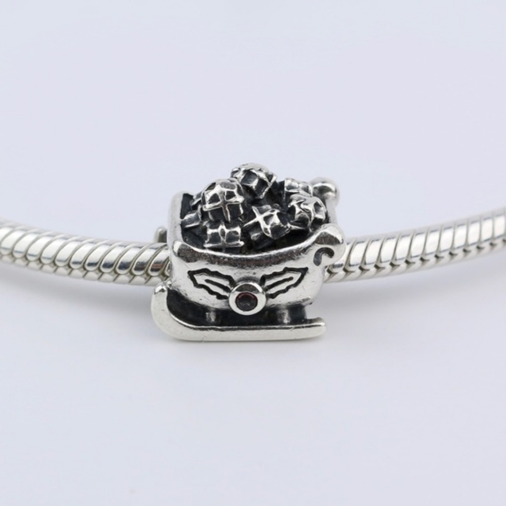 ! *READ DESCRIPTION* Santa Sleigh Garnet Charm